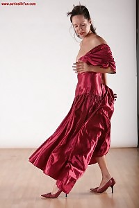 Black-haired Laying As A Secretary In A Purple Sheer Top With A Black Schoolskirt.