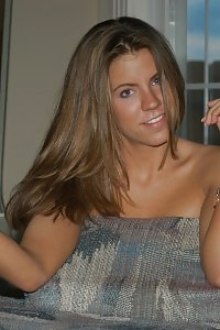 Samantha K In A Smooth Leather Schoolskirt And Violet Hoisery.