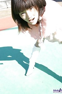 Impressive Black Haired Girl Pees On The Ground