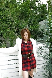 Blonde Pretty Squats Next To Tree To Pee